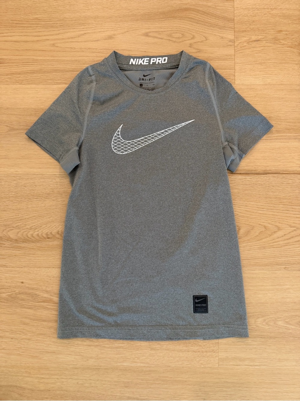 Nike Gray Short Sleeve Dri-FIT Athletic Top with White Swoosh